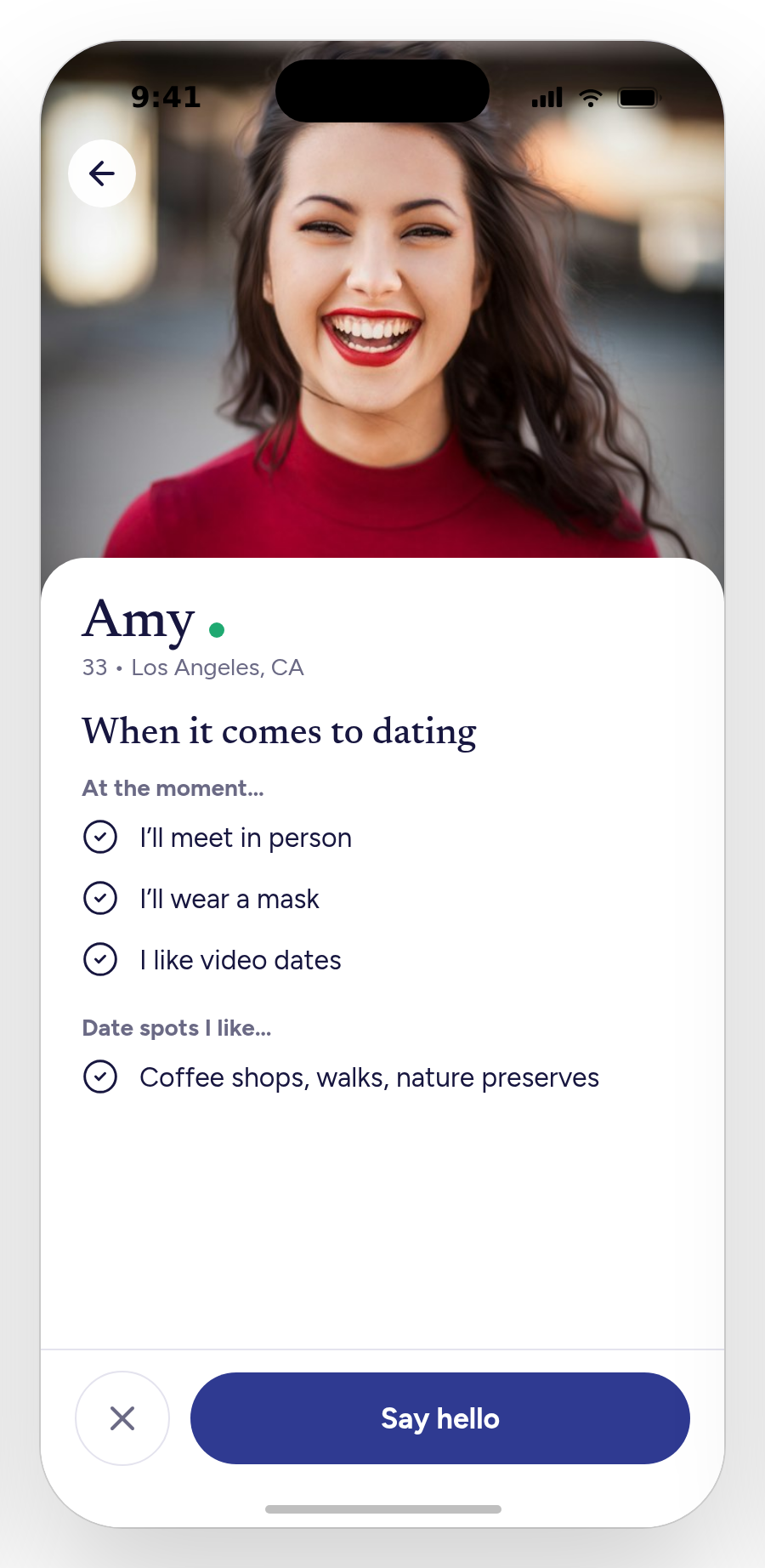 A member profile with dating preferences and a Say hello action
